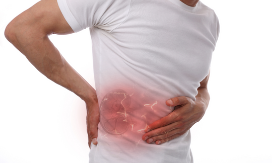 Person experiencing kidney pain as a result of kidney disease or kidney stones