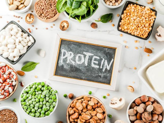 Healthy sources of plant-based protein including almonds, chia, beans, hemp seeds, nuts, lentils